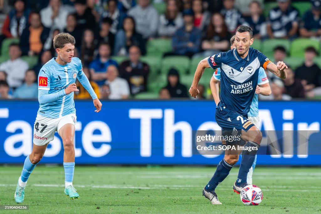 Melbourne Victory's Captain Roderick Miranda (R) seen in...