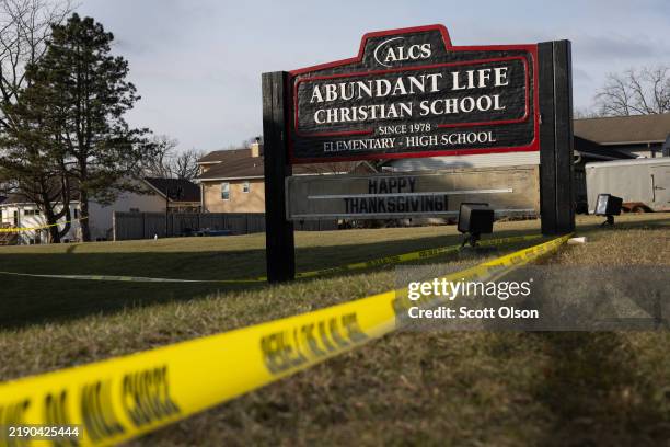 Crime scene tape continues to be stretched around Abundant Life Christian School as police continue to investigate yesterday's shooting on December...