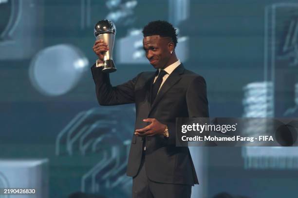 Vinicius Junior of Real Madrid poses for a photo after being presented with The Best FIFA Men's Player Award during the The Best FIFA Football Awards...