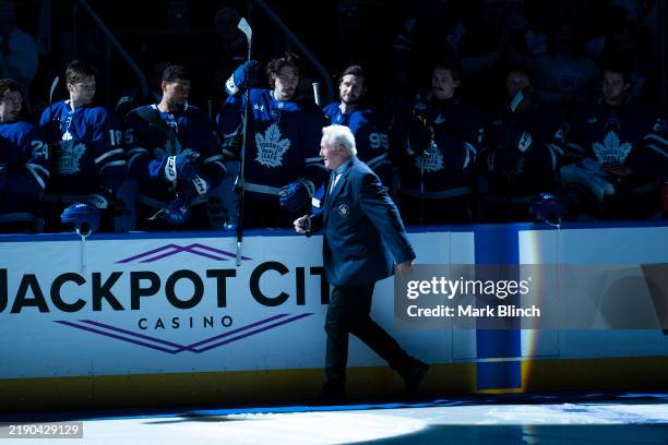 Darryl Sittler walks to centre ice for a ceremonial puck drop before the Toronto Maple Leafs and the Buffalo Sabres play at the Scotiabank Arena on...
