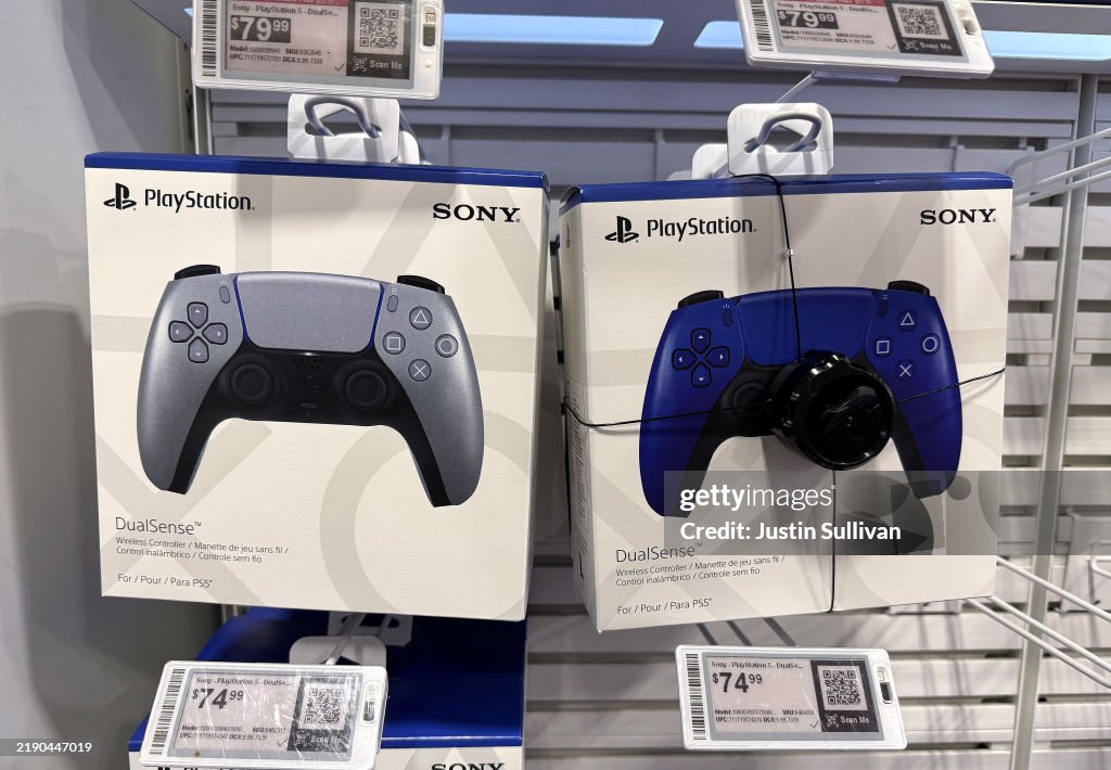Sony Controllers Factory Sony PlayStation game controllers are displayed at a Best Buy store ...