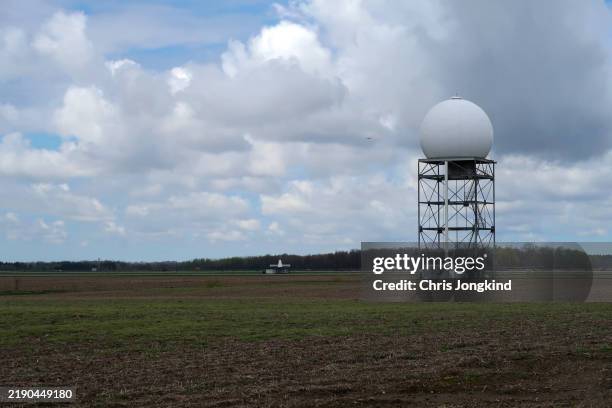 doppler radar structure on airport land - weather radar stock pictures, royalty-free photos & images