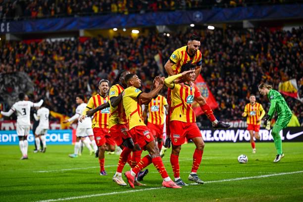 Abdukodir KHUSANOV of Lens celebrates his goal with his teammates Facundo MEDINA, Andy DIOUF, Adrien THOMASSON and M'Bala NZOLA of Lens during the...