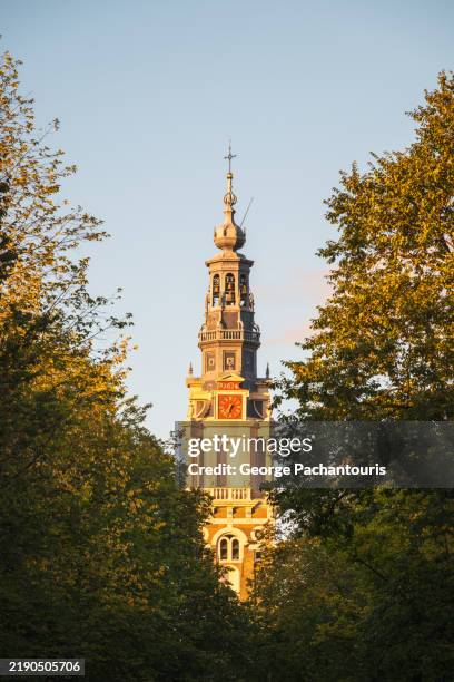 bell tower of zuiderkerk in amsterdam, netherlands - turmuhr stock-fotos und bilder