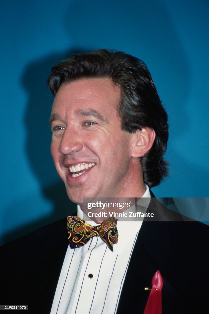 Tim Altmeyer Actor American actor and comedian Tim Alle, wearing a tuxedo over a striped ...