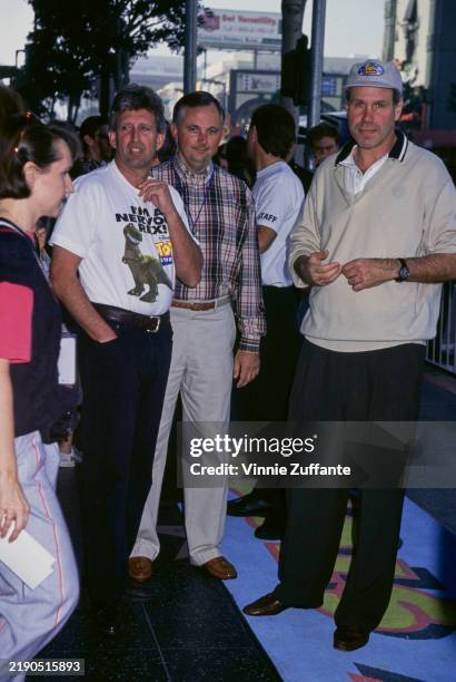 American media executive Joe Roth, Chairman of Walt Disney Studios, wearing an 'I'm a Nervous Rex! Toy Story' t-shirt, American media executive Dick...