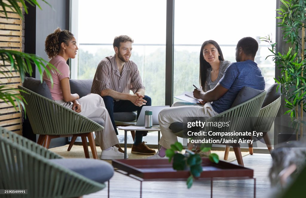 Business colleagues having meeting in modern office