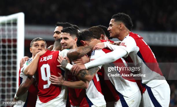 Gabriel Jesus of Arsenal celebrates scoring his team's third goal and his hat-trick goal with teammates during the Carabao Cup Quarter Final match...