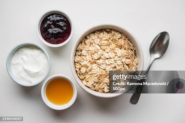 dry oats served with fresh yogurt,jam,and honey - honey stock pictures, royalty-free photos & images