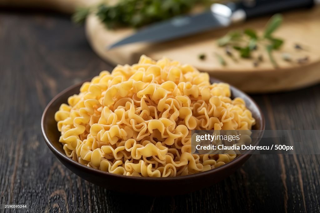 A photo of dry pasta vermicelli in a bowl