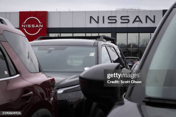 Vehicles are offered for sale at a Nissan dealership on December 18, 2024 in Libertyville, Illinois. Honda, Japan's second largest automaker is in...