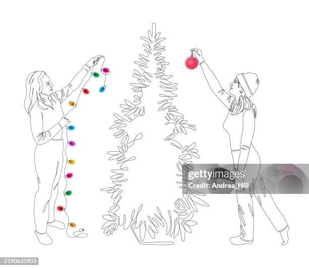 two young women decorate christmas tree single line drawing style vector illustration - couple decorating stock illustrations