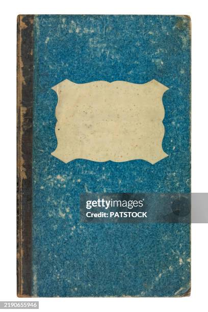 aged vintage blue book cover with empty label - reliure de livre photos et images de collection