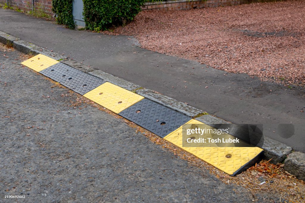 Road Calvert With Ramp Rubber Kerb Ramps At End Of Domestic Drive And Pavement Sidewalk To ...
