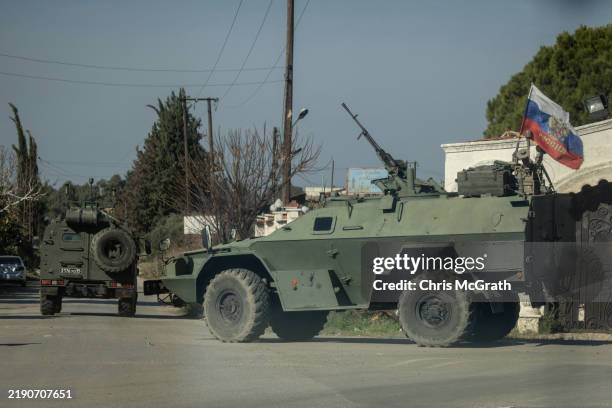 Russian military convoy leaves Hmeimim air base on December 19, 2024 in Latakia, Syria. The port city of Latakia on Syria's Mediterranean coast lies...
