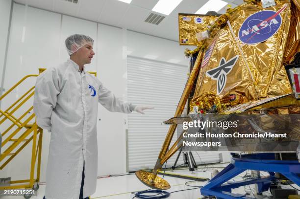The Blue Ghost Mission Operations Engineer, Jaxon Liebeck, showcases the Blue Ghost moon lander at Firefly Aerospace headquarters on Tuesday, Dec. 3,...