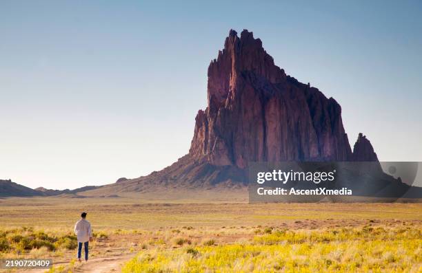 new mexico, ship rock, tourist walking - new mexico stock pictures, royalty-free photos & images