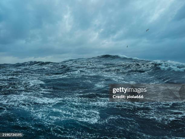on a fishing boat trawler sailing rough sea - noordzee stockfoto's en -beelden