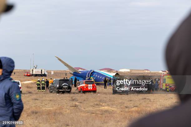 View of the scene after an Azerbaijan Airlines flight with 67 people on board, traveling from the Azerbaijani capital Baku to Grozny in Russia's...