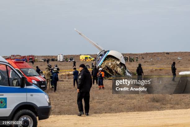 View of the scene after an Azerbaijan Airlines flight with 67 people on board, traveling from the Azerbaijani capital Baku to Grozny in Russia's...