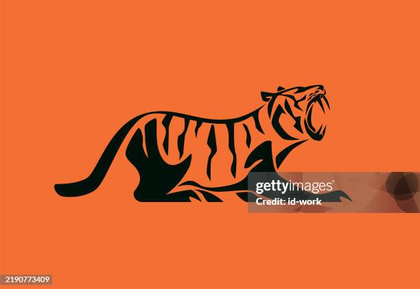 roaring tiger symbol - tiger power stock illustrations