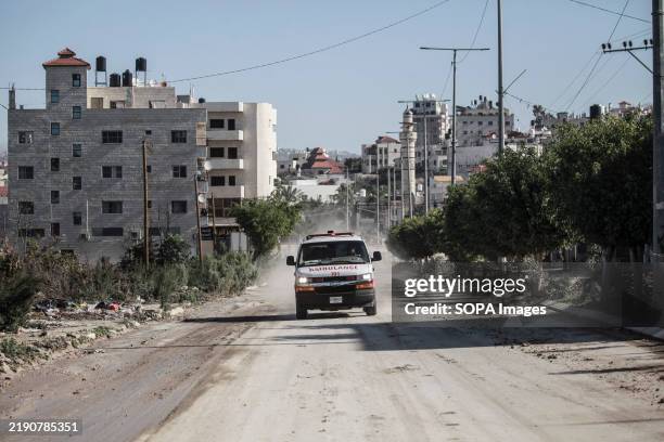 Palestinian Red Crescent ambulance transports injured Palestinians during an Israeli raid on Tulkarm refugee camp in the West Bank. The raid killed...