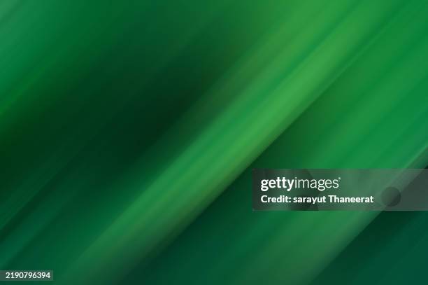 green motion blur background. a refreshing wave of emerald light. the tranquility of a green gradient flow. an abstract harmony of nature's hues. a lush symphony of vibrant greens - high key stock pictures, royalty-free photos & images