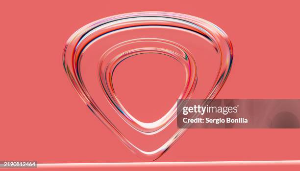 glossy multicolored abstract shapes forming a heart on a red background - blending stock illustrations