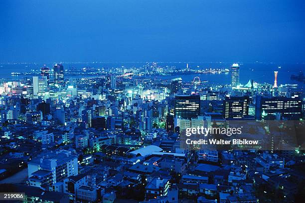 overview of city at night in kobe, japan - kobe imagens e fotografias de stock