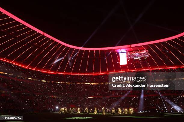 Minute of silence in the stadium due to multiple run over in a christmas market in Magdeburg after the Bundesliga match between FC Bayern München and...