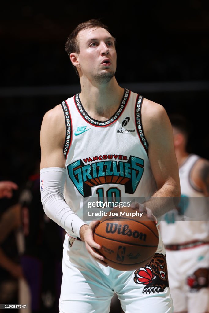 Luke Raptors Luke Kennard of the Memphis Grizzlies shoots a free throw during the ...