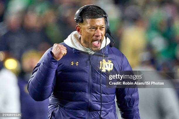 Notre Dame Fighting Irish head coach Marcus Freeman reacts after a play in action during the Playoff First Round game between the Notre Dame Fighting...