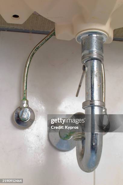 pipe under bathroom sink - kitchen sink stock pictures, royalty-free photos & images