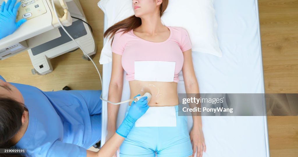 Woman belly ultrasound examination