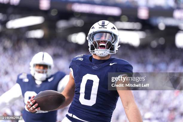 Dominic DeLuca of the Penn State Nittany Lions celebrates after intercepting a pass and returning it for a touchdown during the first quarter against...