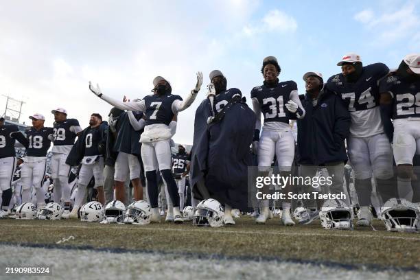 Penn State Nittany Lions players celebrate after defeating the Southern Methodist Mustangs 38-10 in the Playoff First Round Game at Beaver Stadium on...