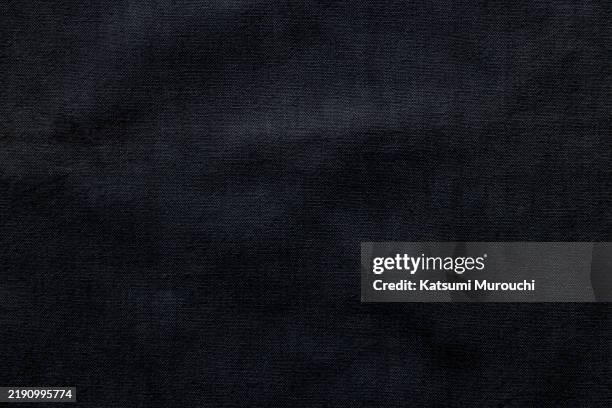 black fabric texture background - trapo de fregar fotografías e imágenes de stock