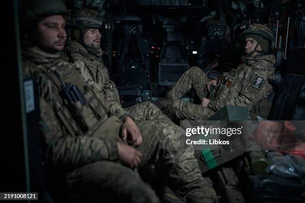 Ukrainian Marine Corps soldiers transfer personnel to British Mastiff infantry fighting vehicle on December 28, 2024 in Kurakhove frontline, Ukraine.