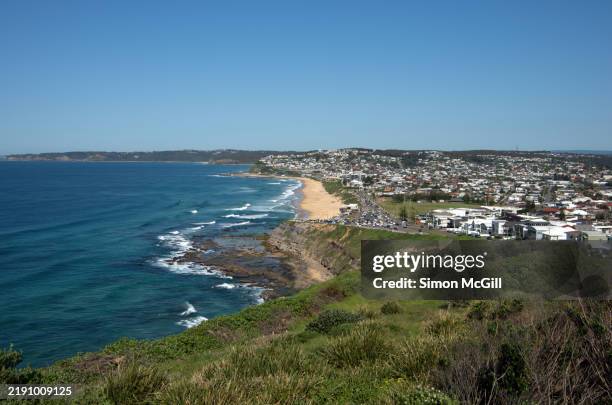 view from the cliffs above susan gilmore beach, north gilmore cove and rockpools and rock platforms to bar beach, dixon park beach and merewether beach, newcastle, new south wales, australia - newcastle new south wales stock pictures, royalty-free photos & images
