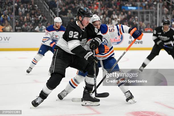 Los Angeles Kings Defenseman Brandt Clarke and Edmonton Oilers Defenceman Troy Stecher battle for position during a Los Angeles Kings game versus the...