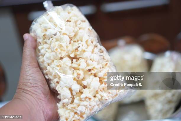 Popcorn In Plastic Packet 50 Plastic Bag Of Popcorn Stock Photos, High-Res Pictures, and Images ...