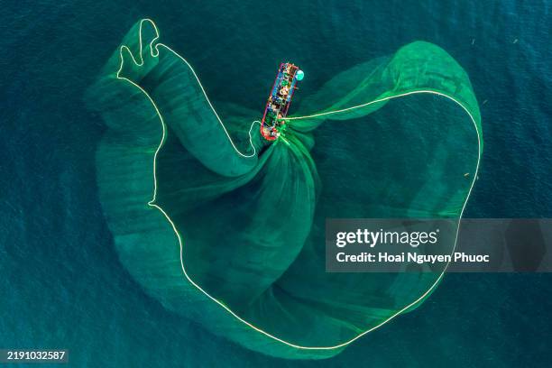 fishing boat - netting stock pictures, royalty-free photos & images