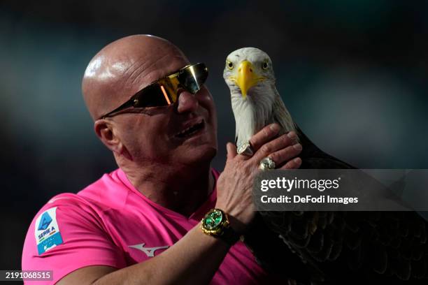Rome, Italy Mascotte of the SS Lazio Eagle Olimpia with the head coach Juan Bernabe prior to the Serie A match between SS Lazio and Atalanta at...