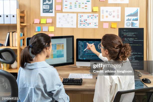 analyst employee working on spreadsheet using desktop computer - spreadsheet computer stock pictures, royalty-free photos & images