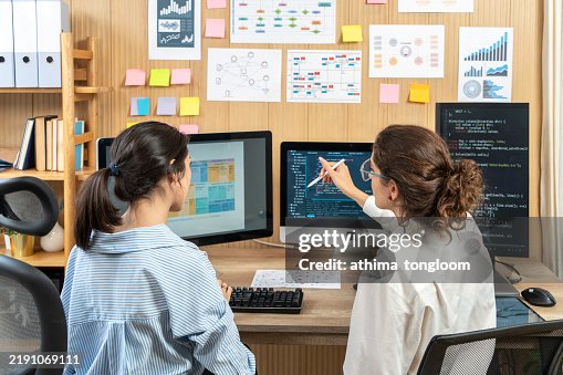 Analyst Employee Working On Spreadsheet Using Desktop Computer Analyst Employee Working On Spreadsheet Using Desktop Computer