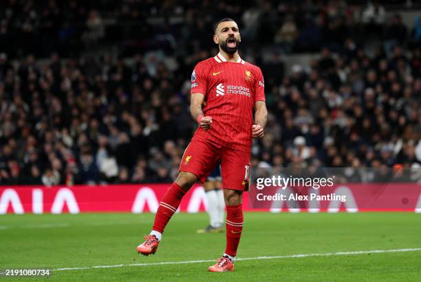 Mohamed Salah of Liverpool celebrates scoring his team's fourth goal during the Premier League match between Tottenham Hotspur FC and Liverpool FC at...