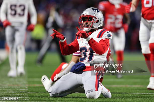 Jonathan Jones of the New England Patriots reacts after defending a pass against the Buffalo Bills during the second quarter at Highmark Stadium on...