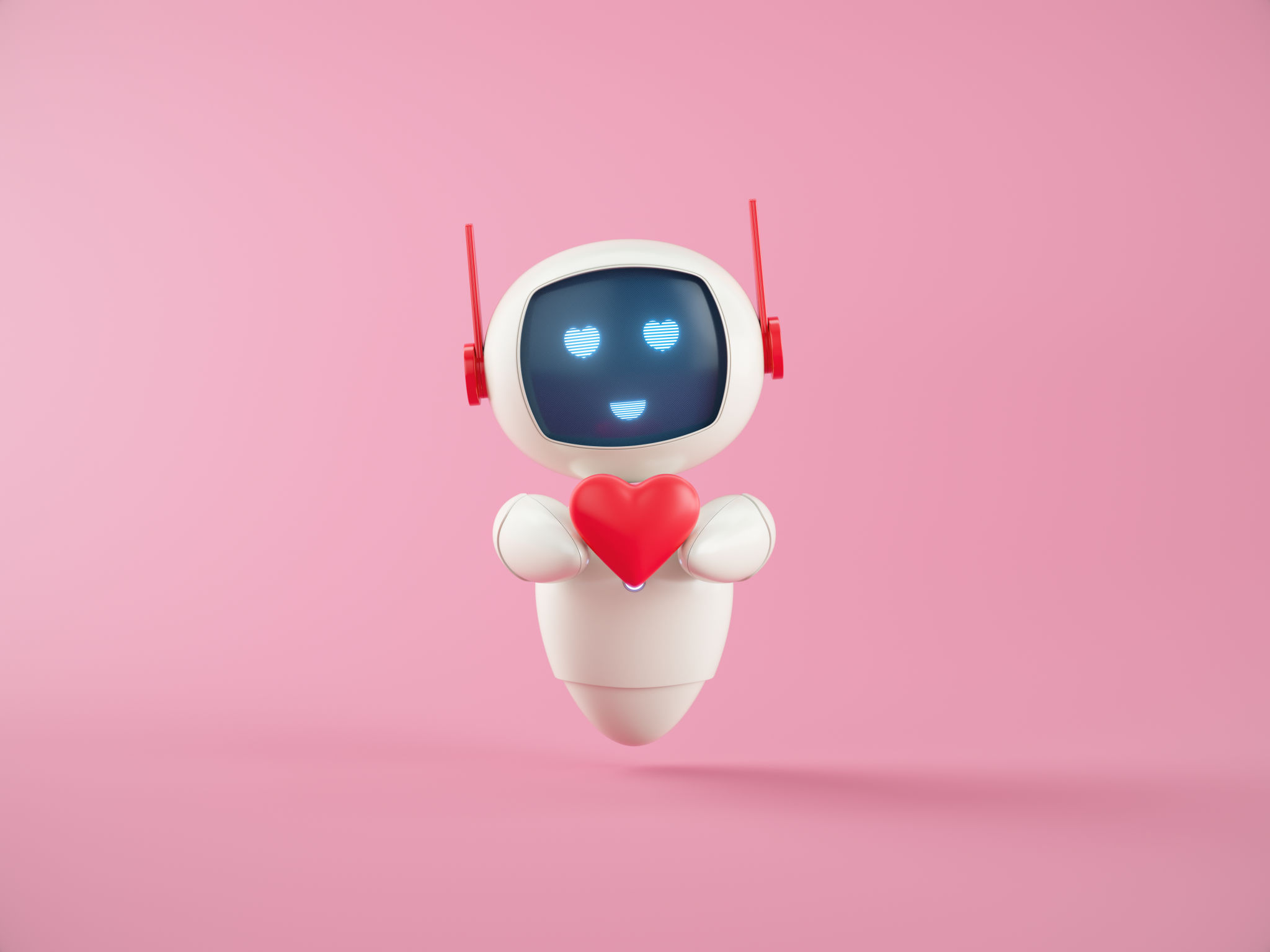 Hands of Artificial Intelligence chatbot assistant holding Heart icon on pink background. Hands of Artificial Intelligence chatbot assistant holding Heart icon on pink background.