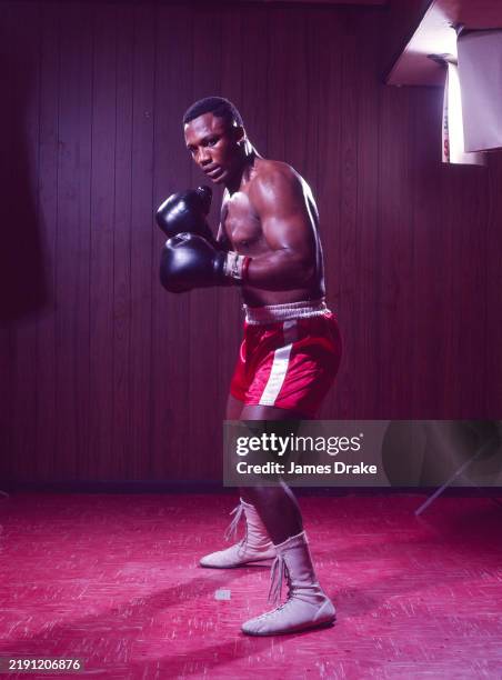 Heavyweight boxer Joe Frazier poses for a magazine photo shoot on June 20, 1967 in Philadelphia, Pennsylvania.