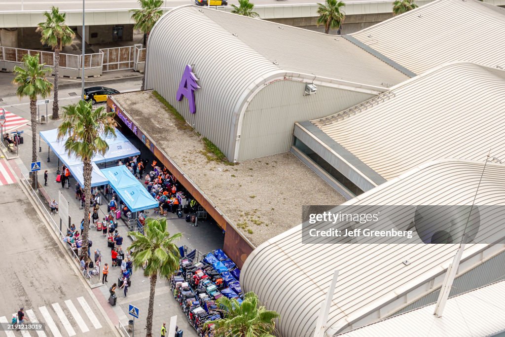 Barcelona, Spain, Catalonia, Port of Barcelona, overhead aerial view of terminal with arriving cruise ship passengers